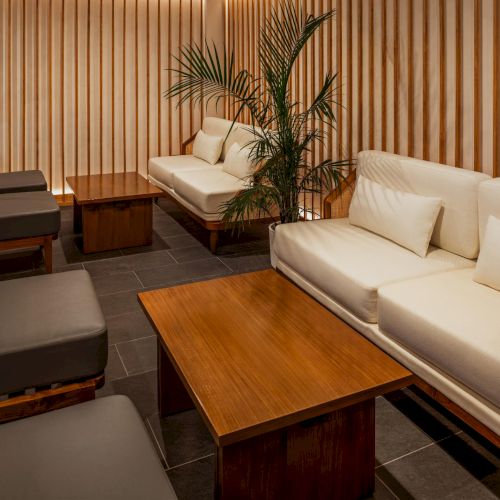 Lounge seating at The Amaya at night, featuring warm lighting, wood textures, and a calm atmosphere