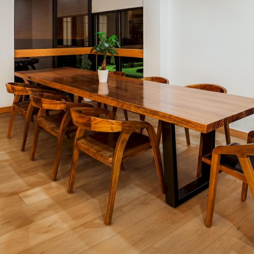 Nighttime view of lounge seating at The Amaya with soft lighting and natural textures