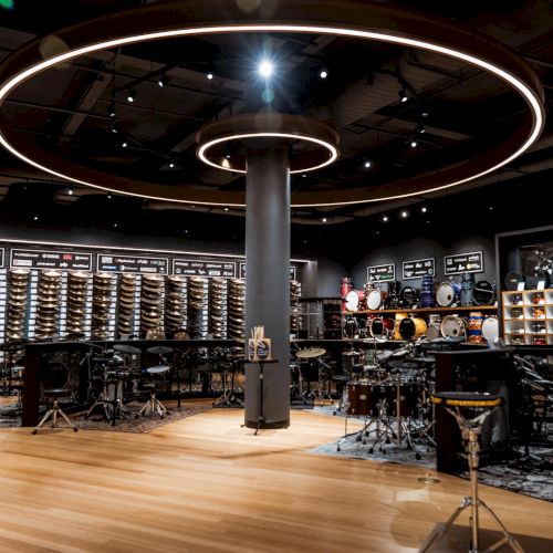 Interior of Sweetwater Studios in Fort Wayne showcasing musical instruments and modern lighting